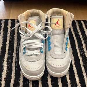 Jordan Kids High-Top Sneakers in Light Gray with Blue Accents and Red Logo